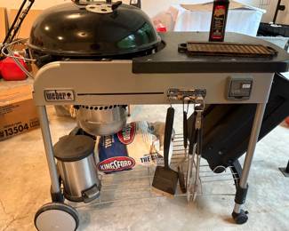 Weber Performer Premium 22 Charcoal Grill mounted in Work Cart with Accessories