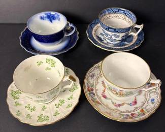 076 fourporcelainteacupsandsaucersassor
