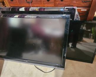 Many different TVs including big screen