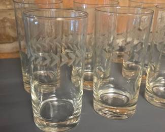 This is a vintage set of Anchor Hocking laurel leaf etched highball glasses.