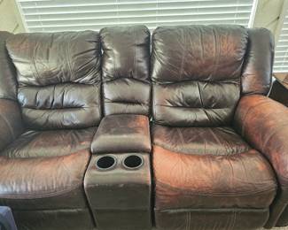 Leather couch with rocker recliners
