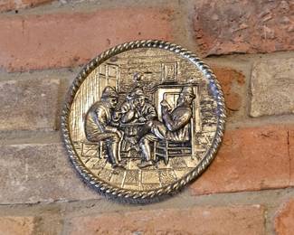 This is a vintage Peerage embossed brass tavern scene wall plate.