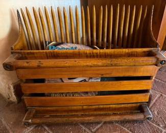 Antique wooden cranberry bog picker/scoop used as magazine rack