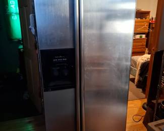 Stainless Steel Side-by-Side Refrigerator with Built-In Water and Ice Dispenser