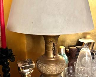 Ornate Asian-Inspired Brass Table Lamp with Embossed Floral & Figural Relief Design and Tapered Ivory Shade