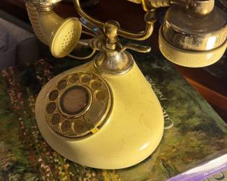Victorian-Style Cream and Brass Rotary Dial Telephone with Decorative Handset and Ornate Metal Accents