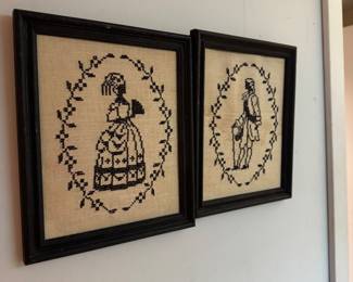 air of framed black cross-stitch or needlepoint silhouettes