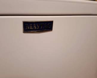 Maytag White Household Laundry Appliance with Classic Chrome & Blue Brand Emblem