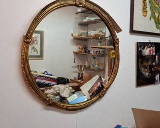 Hollywood Regency Round Giltwood Wall Mirror with Ornate Floral Rosette Accents, Carved Decorative Frame & Gold-Tone Finish