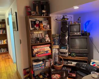 Retro Electronics and Entertainment Collection Featuring Sony PlayStation 3, CRT Televisions, Stereo System, Speakers, Boombox, Vinyl Records, DVDs, VHS Tapes, LEGO Architecture Sets, Monopoly Board Games and Collectible Toys