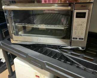 Oster oven, new, out of box