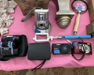 Fuifilm FinePix waterproof digital camera with docking cradle, Sony Cyber-shot compact digital camera, Nikon COOLPIX 3.5x optical zoom