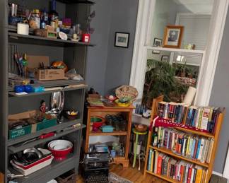 books, cooking and entertainment items, typewriter, art, rug