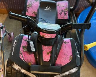 Childs electric four wheeler
