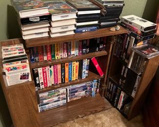 VHS CDs and music cabinet