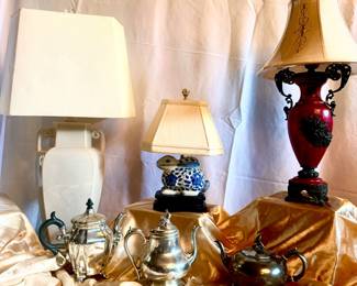Lamps and assorted tea and coffee pots