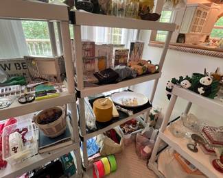 various household items, glassware, and boxes.