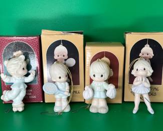 4 Precious Moments sports ornament's