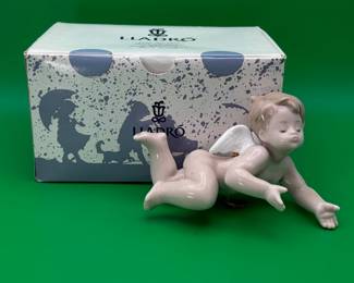 Vintage Lladró "Playing Cherub" porcelain figurine