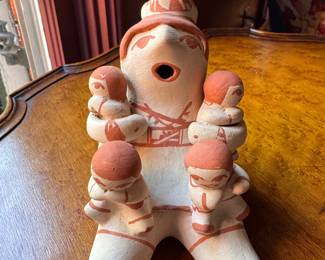 Pueblo Storyteller Pottery Doll. Measures 6" H x 5" D. Photo 1 of 3.