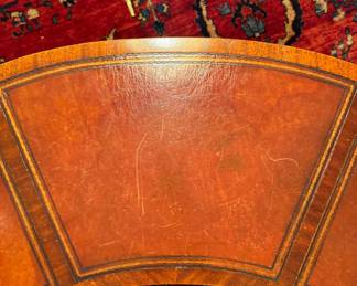 Horseshoe Shaped Tooled Leather Drop-Leaf Coffee Table. Measures 48" W x 22" D as Pictured; Has 2 11" Drop Leaves. Photo 6 of 8.