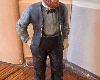 Cast Iron Amish Man Doorstop. Measures 9" H. Photo 1 of 2.