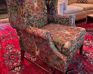 Wing Back Chair with Nailhead Trim Upholstered in Deer Motif Pattern. Measures 32" W x 34" D with 18" Seat Height. Photo 2 of 8.