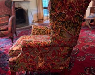 Wing Back Chair with Nailhead Trim Upholstered in Deer Motif Pattern. Measures 32" W x 34" D with 18" Seat Height. Photo 3 of 8.