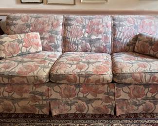 Floral Upholstered Sleeper Sofa. Measures 78" W x 36" D.