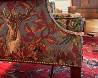 Wing Back Chair with Nailhead Trim Upholstered in Deer Motif Pattern. Measures 32" W x 34" D with 18" Seat Height. Photo 5 of 8.