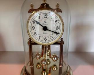 Elgin Anniversary Mantle Clock with Glass Dome and Rotating Pendulum.