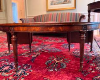 Horseshoe Shaped Tooled Leather Drop-Leaf Coffee Table. Measures 48" W x 22" D as Pictured; Has 2 11" Drop Leaves. Photo 2 of 8.