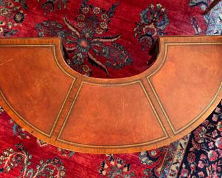 Horseshoe Shaped Tooled Leather Drop-Leaf Coffee Table. Measures 48" W x 22" D as Pictured; Has 2 11" Drop Leaves. Photo 3 of 8.