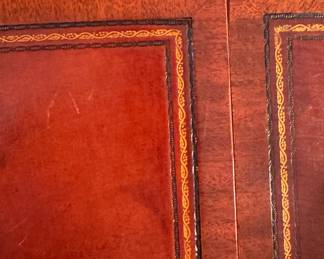 Horseshoe Shaped Tooled Leather Drop-Leaf Coffee Table. Measures 48" W x 22" D as Pictured; Has 2 11" Drop Leaves. Photo 7 of 8.