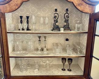 Cabinet interior lined with damask fabric