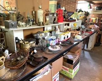 Unboxed items from the other homes and storage spaces.