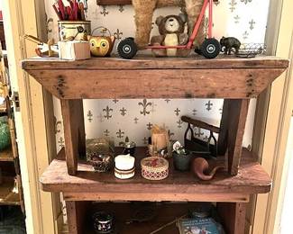 Fun display of Bucket Benches, Cast Iron Banks, Toys & Bakelite items.