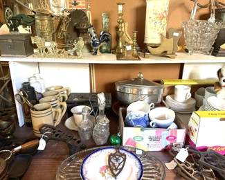 No rhyme or reason to what the tables and shelves will reveal...treasures everywhere.