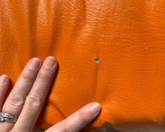 Hermes-Orange Color Vinyl Upholstered Sleeper Sofa. Slight Tear on Fabric. Measures 106" W x 36" D. Photo 5 of 6.