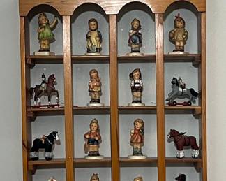 Hummel Figurine Collection with Display Shelf and Miniature Cars