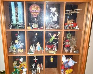Collection of Vintage Figurines in Wooden Display Case