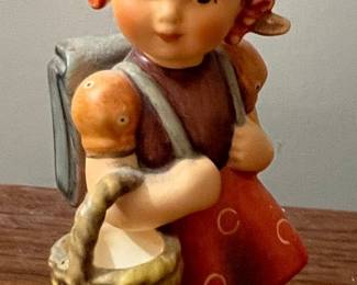 Hummel School Boy and School Girl Figurines