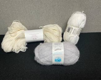 Lot # : 200 - 7 Skeins of White to Cream Yarn