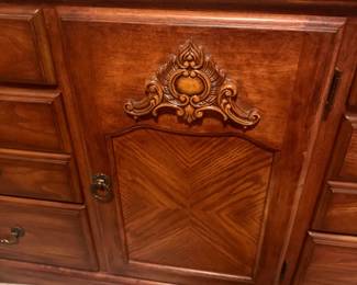 Traditional Oak Queen Bedroom Suite — $750 Includes queen bed, dresser with large mirror, tall chest, and 1 matching nightstand. Excellent condition with beautiful carved detailing and decorative hardware.