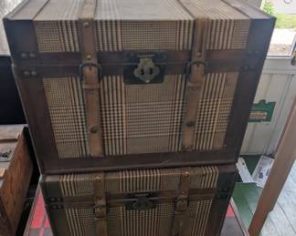 Antique trunks with leather straps