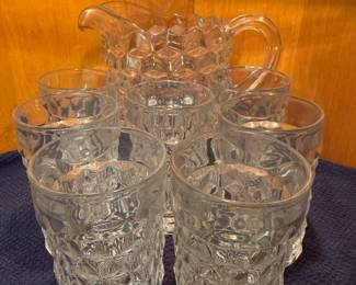 Believe its a Fostoria pitcher and 7 glasses