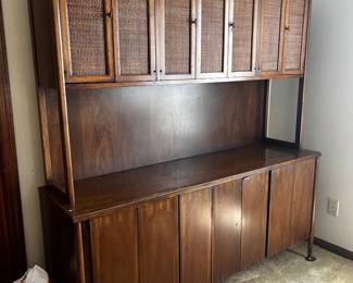 Vintage Mid Century Modern hutch with cabinet doors on top and bottom.