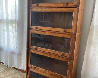 Vintage five stack oak barrister bookcase with classic flip up glass doors.