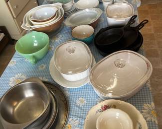 Covered casserole dishes, serving bowls, mixing bowls, iron skillet and more