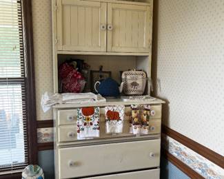 Great vintage two piece painted hutch with lower drawers and upper cabinet doors and open shelves.